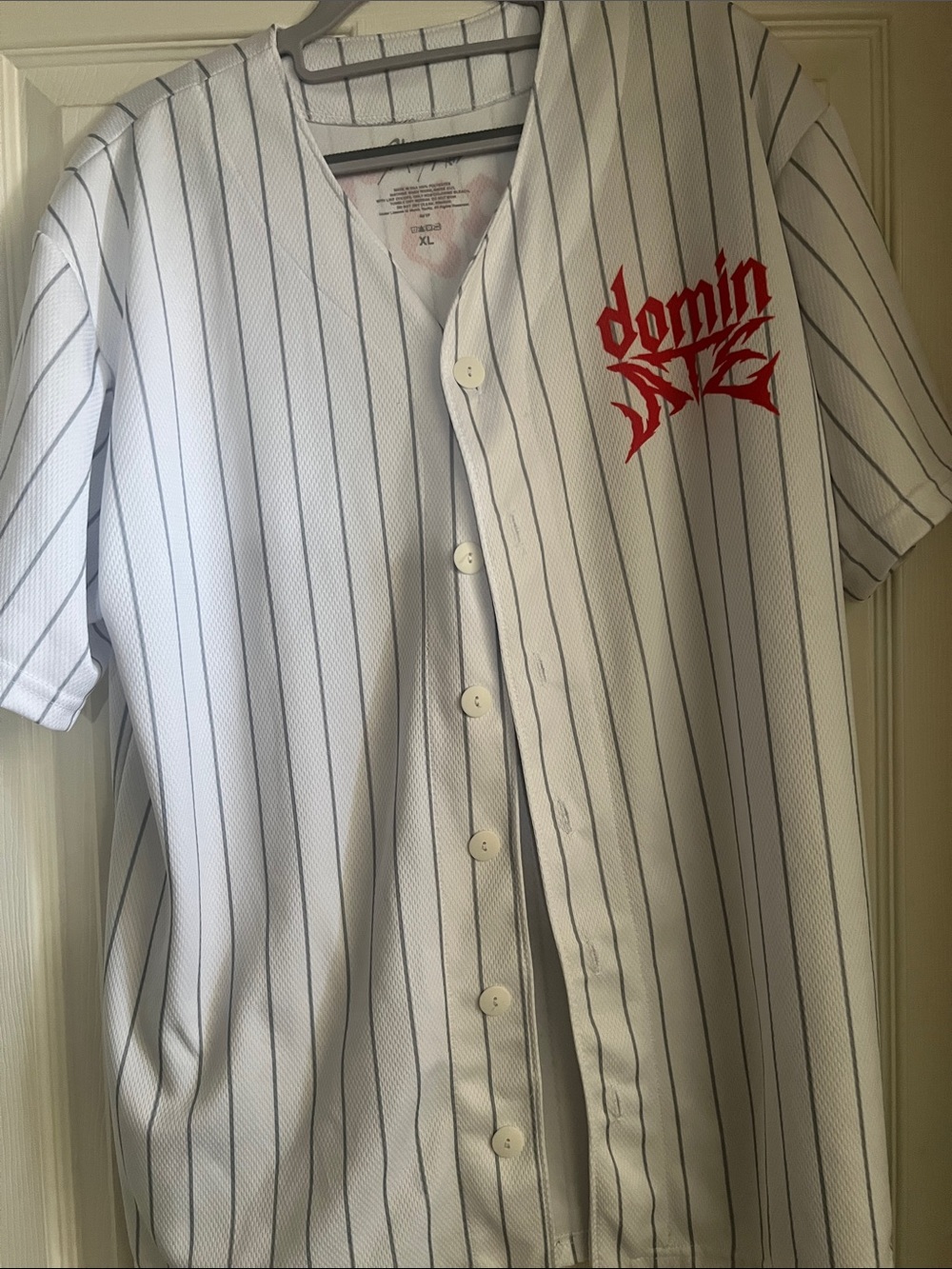 White Pinstripe Baseball Jersey with Red Chest Logo